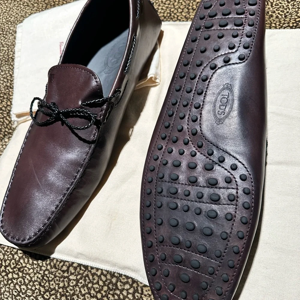Tod's Men's Boat Shoes in Dark Brown with Black Laces